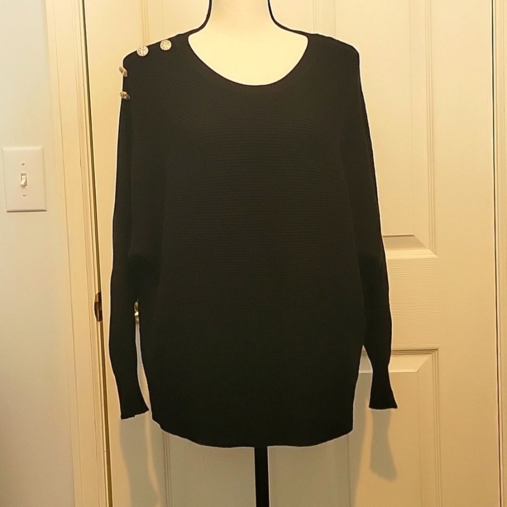 Tahari black knit Ribbed sweater with rhinestone button detail. Size Medium.